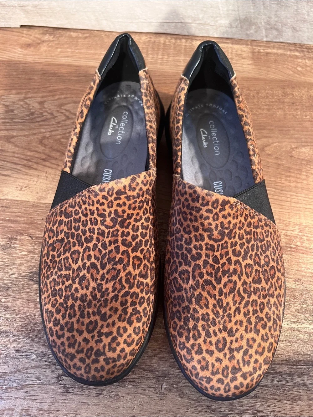 Clarks Cheetah Print Slip-On Flats in Brown and Black Kayleigh Step Loafers